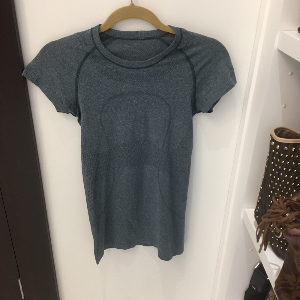Blue Lululemon shirt with green trim